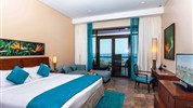 Sofitel The Palm Dubai 5* - Luxusní pokoj Luxury Sea View Room v resortu Sofitel The Palm Resort & Spa Dubai s balkonem, výhledem na moře a audiosystémem Bose.